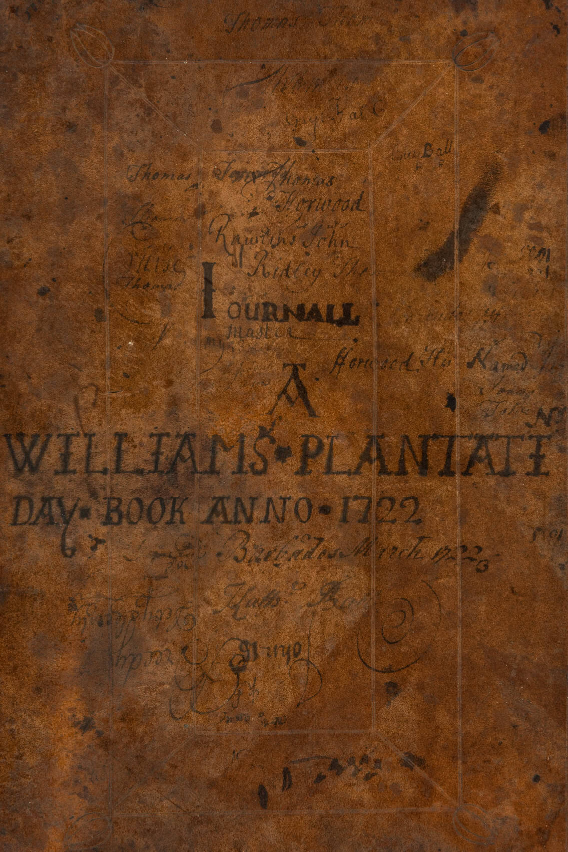 Leather cover of a book dating from 1722, which has hand written names and dates on the front