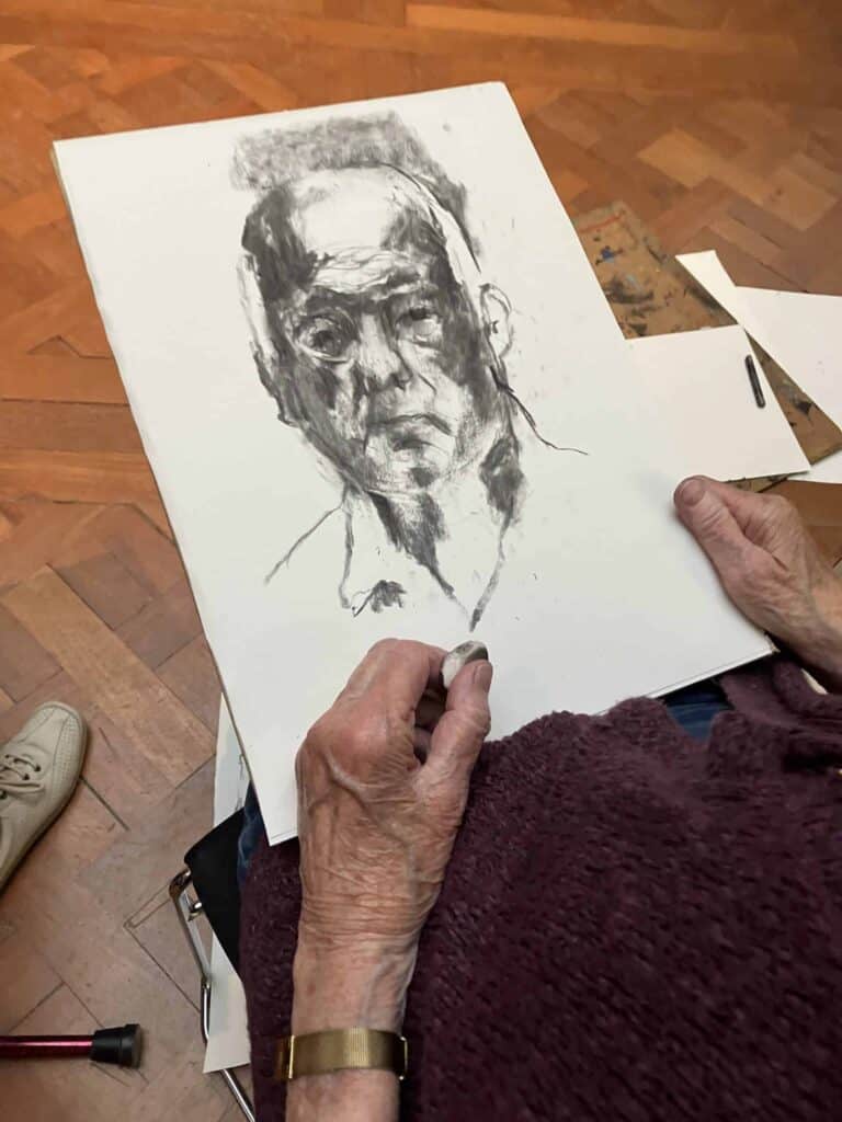 Photo showing a drawing of a man's head, created during a Portrait Club session at the museum