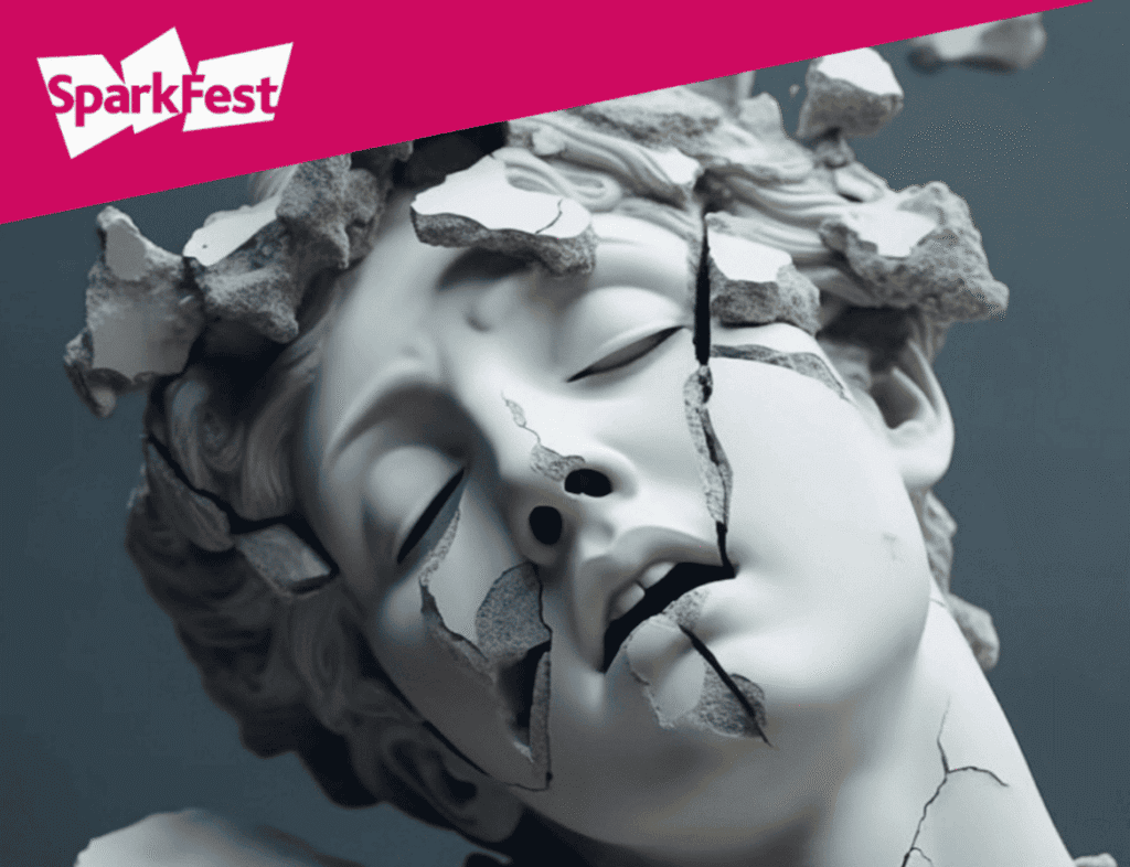 Photo showing an ancient sculpture of a head, which has been destroyed