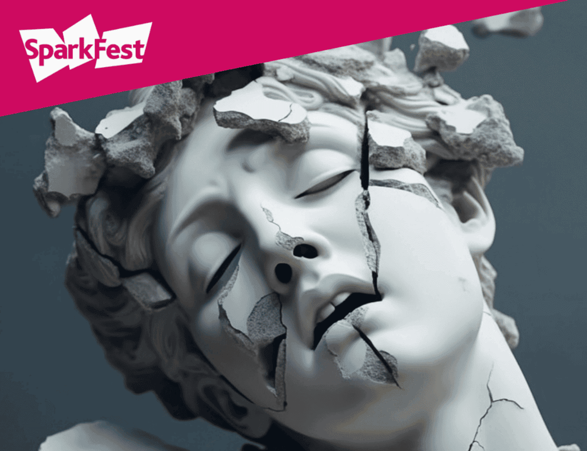 Photo showing an ancient sculpture of a head, which has been destroyed